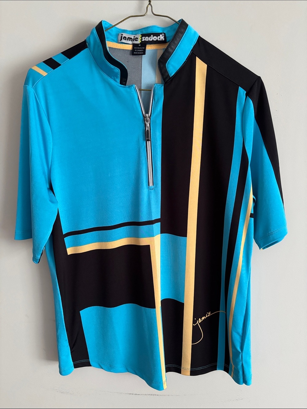 jamie sadock Turquoise Black and Yellow Colorblock Zip-Front Golf Polo
